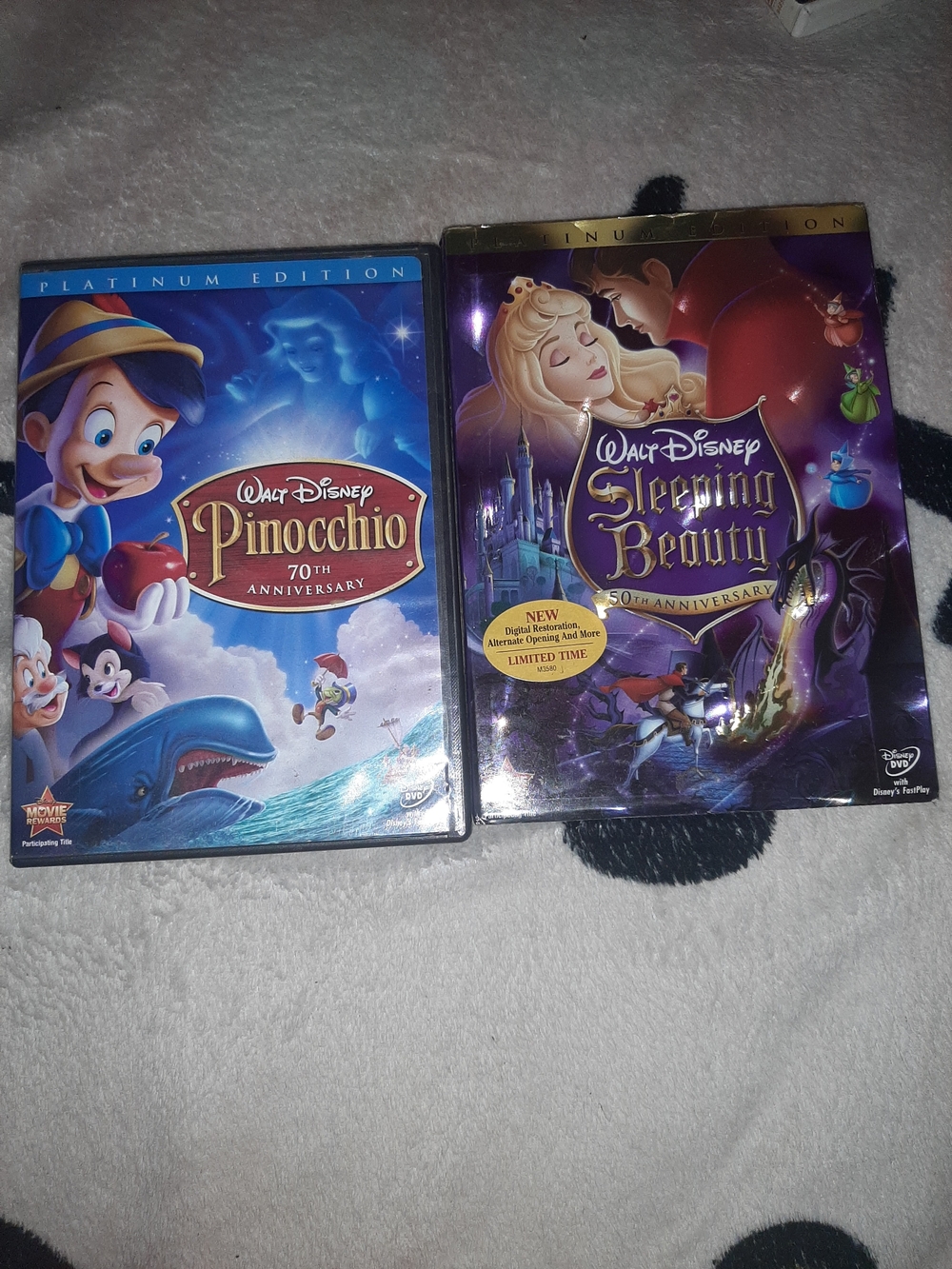 Disney DVD Pair with Blue and Purple Backs